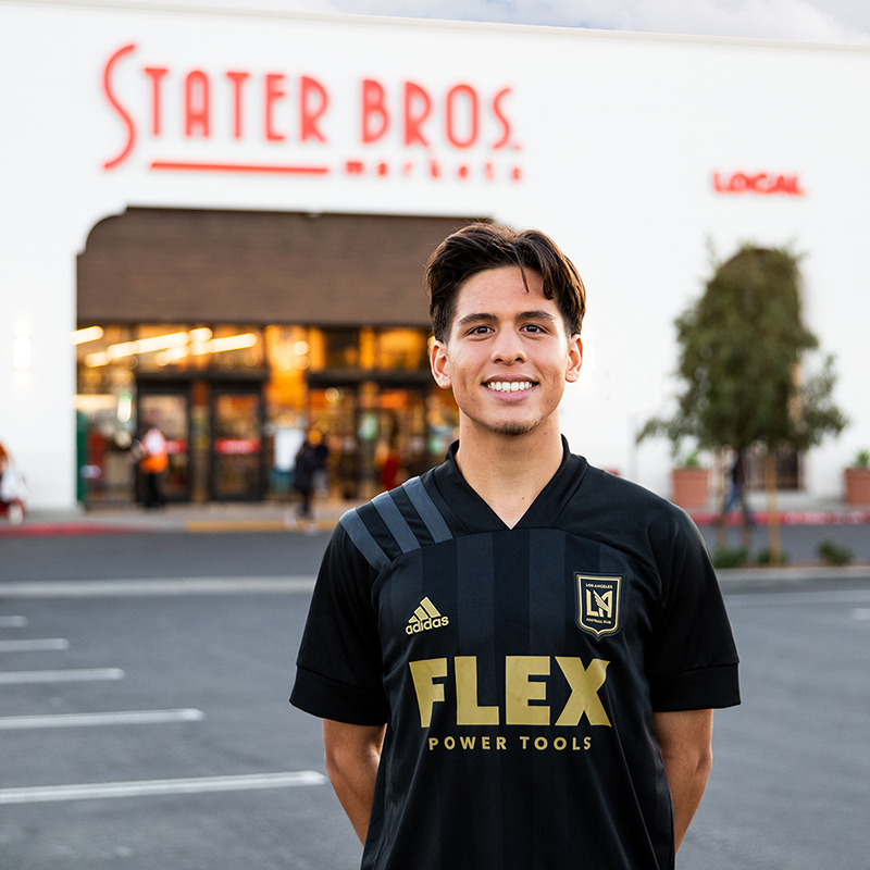 Christian Torres in front of Stater Bros. Store